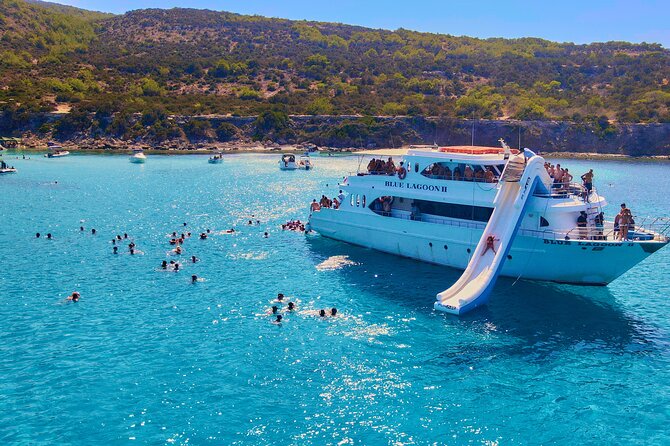 Blue Lagoon (Akamas) Bus & Boat Tour with Water Slide From Paphos - Fruit, lemonade, and the ride back