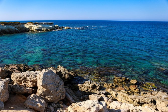 Blue Lagoon and Aphrodite's Baths Guided Day Tour from Paphos - Swimming at the Blue Lagoon