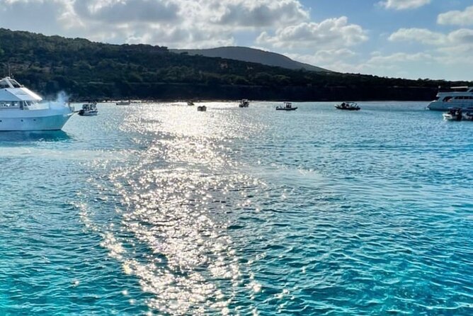 Blue Lagoon cruise: giant slide, music & Paphos hotel transfers - Manolis Bay and Fontana Amorosa