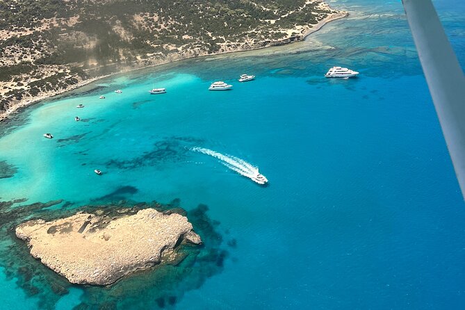 Blue Lagoon Latchi Pafos, boat trip with water slide F/D - Banana plantations, sea caves, and the Edro III