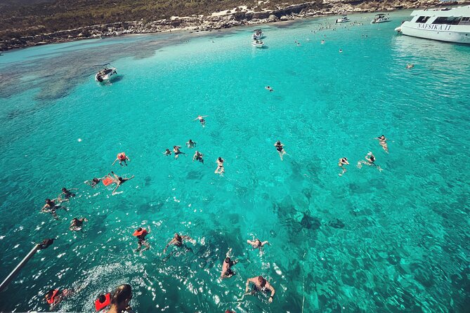 Blue Lagoon trip with slide & music departing from Latchi harbour - One hour at the Blue Lagoon