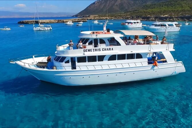 Demetris Chara Boat/Blue Lagoon boat trips with BBQ and SLIDE - Leaving Latchi Harbour for the Blue Lagoon