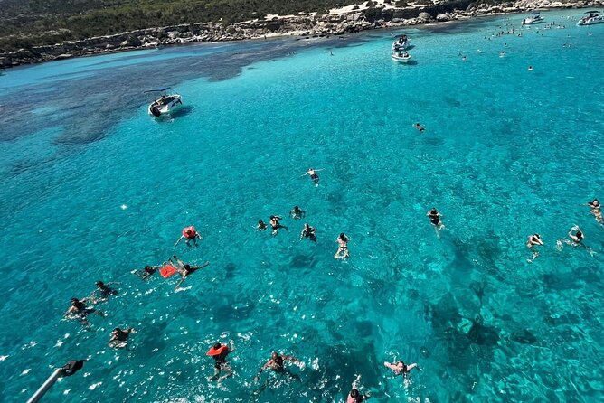 From Paphos: Blue Lagoon Cruise With Water Slide - Swimming and snorkeling in clear water