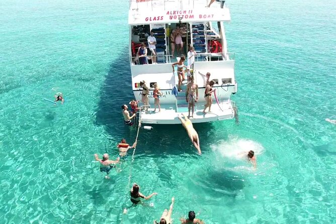 Latchi to Blue Lagoon Glass Bottom+slide Boat Tour - Reaching the Blue Lagoon