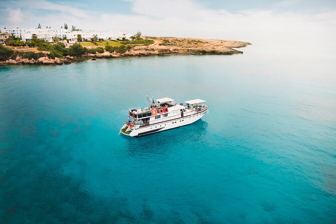 Protaras: St Georgios Presidential Cruise BBQ & 1 drink. 16+ - Cape Greco’s caves, Shark Mouth Cave, and Lovers Bridge